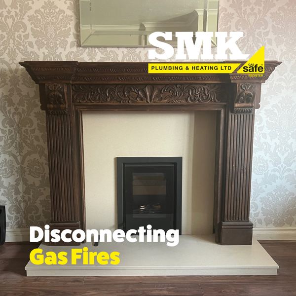 Carved fire surround with a new fire fitted